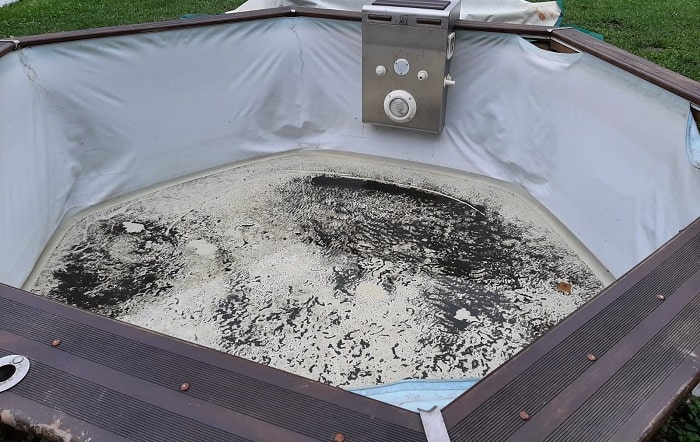 piscine hors-sol en bois avec liner à remplacer par un revêtement en résine et fibre de verre